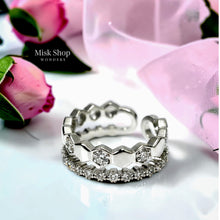 Silver connected double ring with polished hexagonal and textured bands