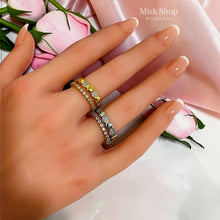 Gold and silver connected double rings worn on hand