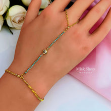 Close-up of blue zircon hand chain with clear round centerpiece – Misk Shop