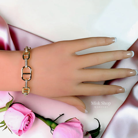 18K gold plated APM Monaco inspired link bracelet with zircon details for women by Misk Shop.