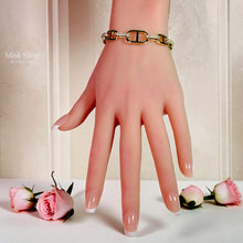 18K gold plated APM Monaco inspired link bracelet with zircon details for women by Misk Shop.
