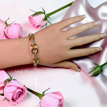 18K gold plated APM Monaco inspired link bracelet with zircon details for women by Misk Shop.