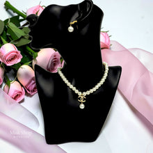 Chanel inspired pearl necklace and matching drop earring styled with pink roses