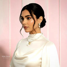 Model wearing Chanel inspired pearl necklace and matching zircon earrings
