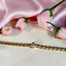 18K gold plated Cuban chain bracelet with a sparkling zircon center ring and adjustable extension for women by Misk Shop.