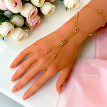18K gold plated hand chain bracelet worn on hand - Misk Shop