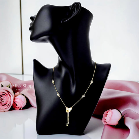 Long 18K gold plated 304 stainless steel necklace with a natural mother-of-pearl butterfly, zircon accents, and twin drop chains by Misk Shop.