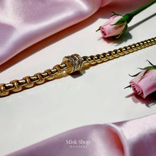 Luxury 18K gold plated chain bracelet with a sparkling zircon cylinder centerpiece and adjustable extension for women by Misk Shop.