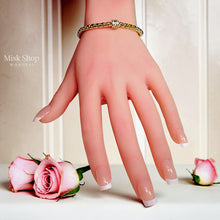 Luxury 18K gold plated chain bracelet with a sparkling zircon cylinder centerpiece and adjustable extension for women by Misk Shop.