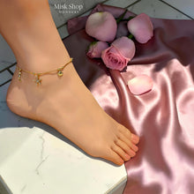 Adjustable 18K gold plated stainless steel marine charm anklet with a zircon starfish, seahorse and shell by Misk Shop.