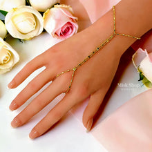 18K gold plated minimal multi-strand hand chain bracelet worn across the hand