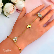 Gold hand chain ring with high-transparency zircon and organic sculpted motifs