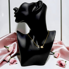 Medium-length 18K gold plated titanium steel rose stem necklace with a white bud detail and 3A zircon leaves by Misk Shop.