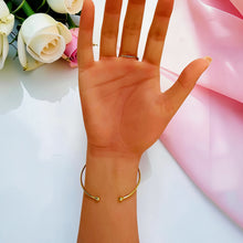 18K gold plated zircon hand chain bracelet with open cuff and bow detail - Misk Shop