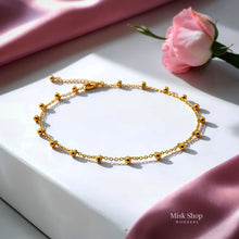 21K gold-plated adjustable beaded anklet featuring polished gold beads and Misk Shop Color Protection Technology.