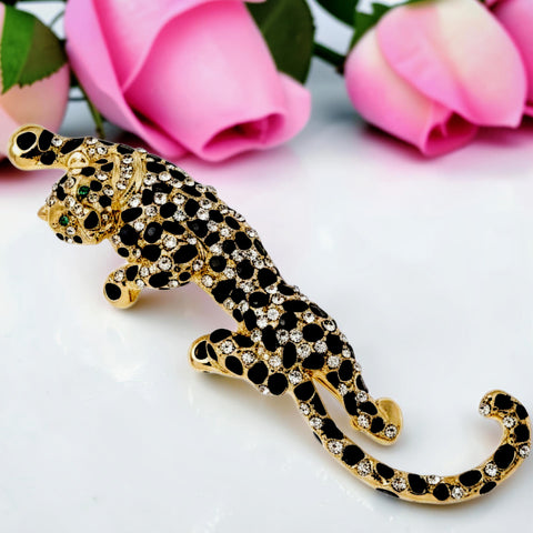 Handcrafted 21K gold color black panther brooch inspired by Cartier with black and clear zircon stones and green eyes by Misk Shop.
