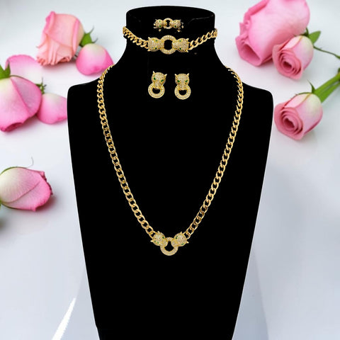 Complete 21K gold plated Cartier Inspired panther jewelry set displayed on a black bust by Misk Shop.