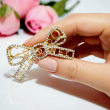 Handcrafted 21K gold color Chanel inspired bow brooch decorated with sparkling zircon stones by Misk Shop.