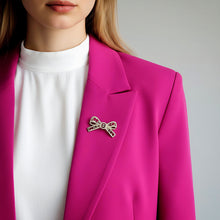 Handcrafted 21K gold color Chanel inspired bow brooch decorated with sparkling zircon stones by Misk Shop.