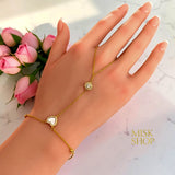 21K gold plated heart and sun zircon hand chain bracelet worn across the hand