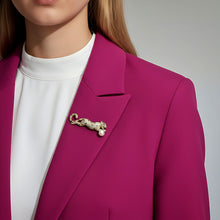 Handcrafted 21K gold plated leopard brooch with zircon stones and pearl by Misk Shop.
