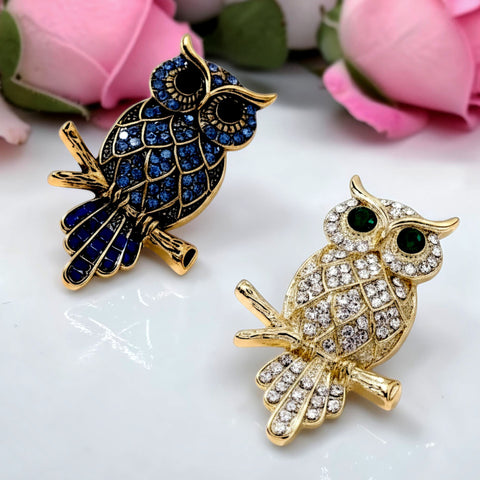Handcrafted 21K gold color owl brooch with sparkling zircon stones available in gold and navy blue by Misk Shop.