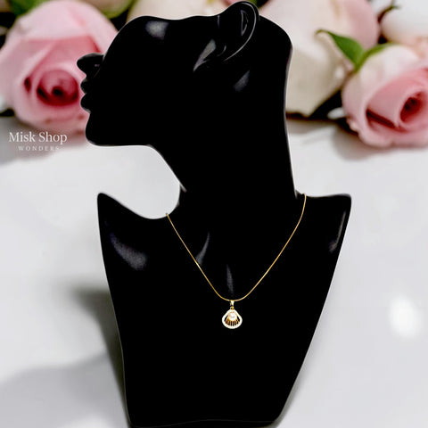 Short 21K gold plated titanium steel necklace with pearl pendant and zircon stones from Misk Shop.