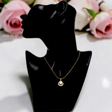 Short 21K gold plated titanium steel necklace with pearl pendant and zircon stones from Misk Shop.