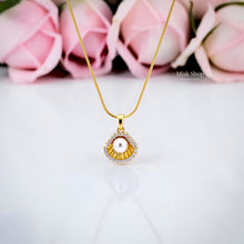 Short 21K gold plated titanium steel necklace with pearl pendant and zircon stones from Misk Shop.