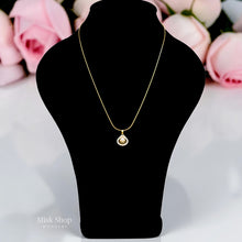 Short 21K gold plated titanium steel necklace with pearl pendant and zircon stones from Misk Shop.