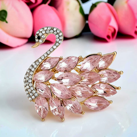 Handcrafted 21K gold color swan brooch with blush pink crystals and sparkling zircon stones by Misk Shop.