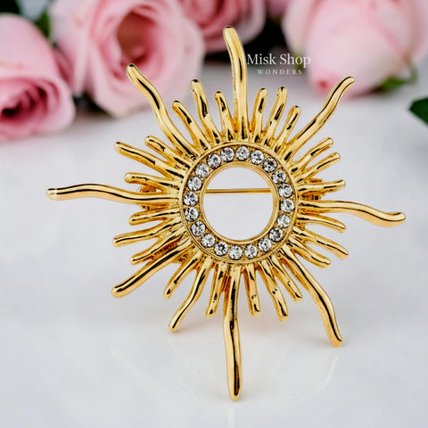 Handcrafted 21K gold color sunburst brooch with sparkling zircon stones by Misk Shop.