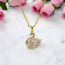 Luxury 21K gold color triple layer necklace with a swan pendant decorated with marquise zircon stones by Misk Shop.