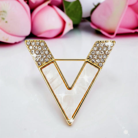 Handcrafted 21K gold color V brooch inspired by Valentino with natural mother of pearl and zircon stones by Misk Shop.