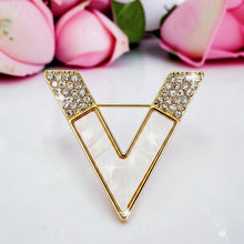 Handcrafted 21K gold color V brooch inspired by Valentino with natural mother of pearl and zircon stones by Misk Shop.