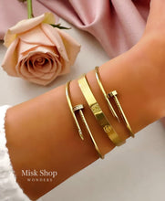 Minimal gold nail bangle 18K plated stainless steel no stones
