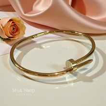Minimal gold nail bangle 18K plated stainless steel no stones
