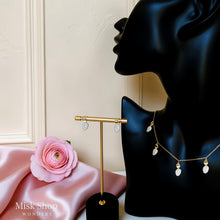 Adjustable zircon drop necklace set that can be worn as choker or longer, available in gold and silver