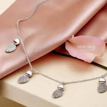 Adjustable zircon drop necklace set that can be worn as choker or longer, available in gold and silver