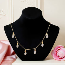 Adjustable zircon drop necklace set that can be worn as choker or longer, available in gold and silver