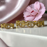 Zircon bracelet and ring set inspired by APM Monaco in gold and silver tones, Misk Shop.
