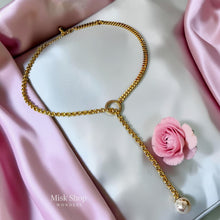 18K gold plated asymmetrical long necklace featuring a zircon circle detail and natural cultured pearl pendant by Misk Shop