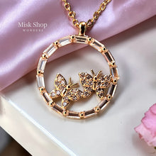 سنسال فراشتين داخل إطار دائري مرصع زركون مطلي ذهب عيار 21 من Misk Shop