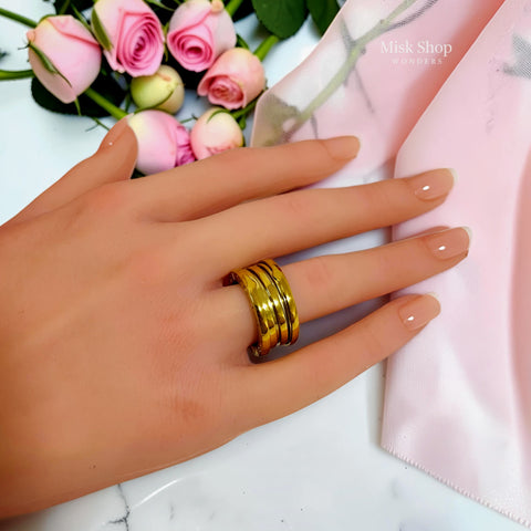 Bvlgari-inspired 21K gold plated wide band ring worn on hand