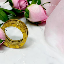 Side view of Bvlgari-inspired layered gold plated ring