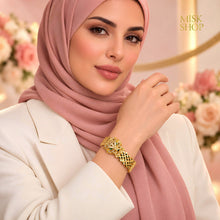 Cartier-inspired tiger bracelet styled on modest model