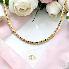 Chaumet-inspired alternating faceted gold and clear zircon necklace