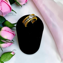 Triple-band Chaumet-inspired zirconia ring on display