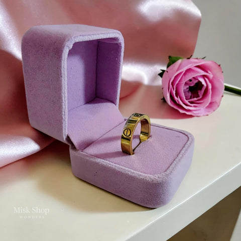 Classic gold love inspired ring with signature engravings and luxury polished finish by Misk Shop
