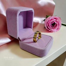 Classic gold love inspired ring with signature engravings and luxury polished finish by Misk Shop